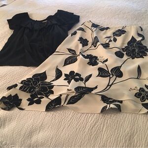 2 piece , skirt is fully lined . It has elastic waist fits 29- 34 “